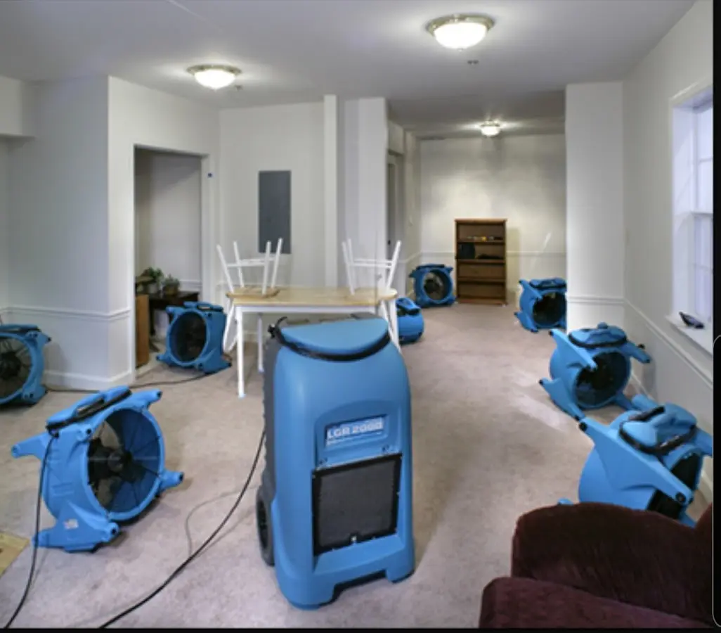 Air movers and dehumidifier setup for Water Damage Restoration in Tupper Lake